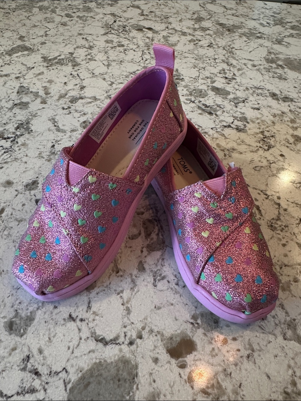 NWOT-TOMS Pink Glitter Heart Print Slip-On Sneakers. Size 11